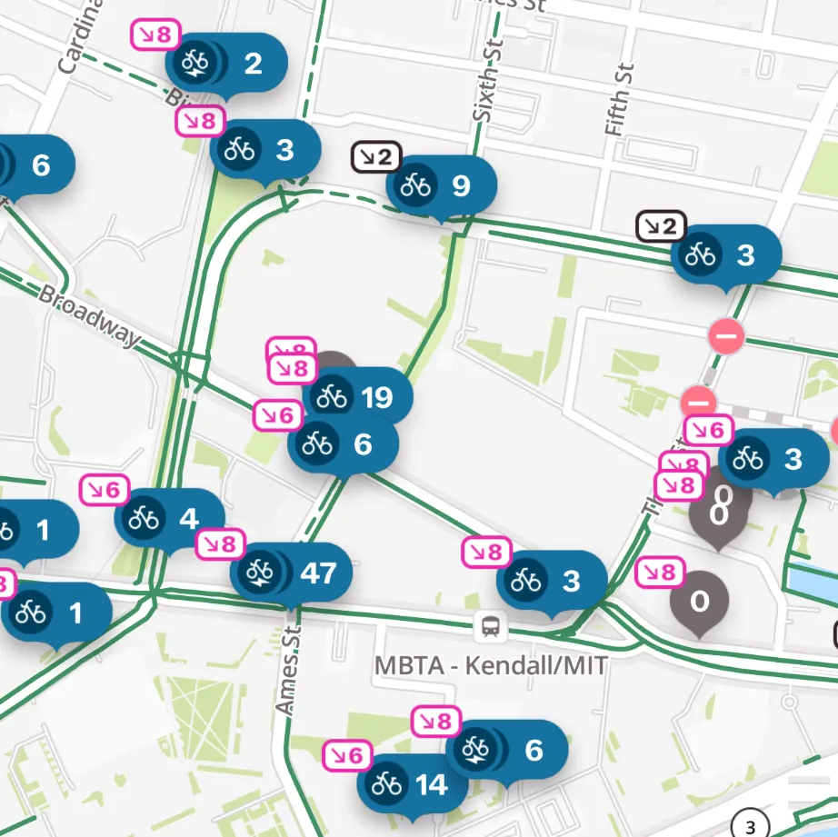 A map showing BlueBikes stations near Kendall Square, most with dropoff point values attached.