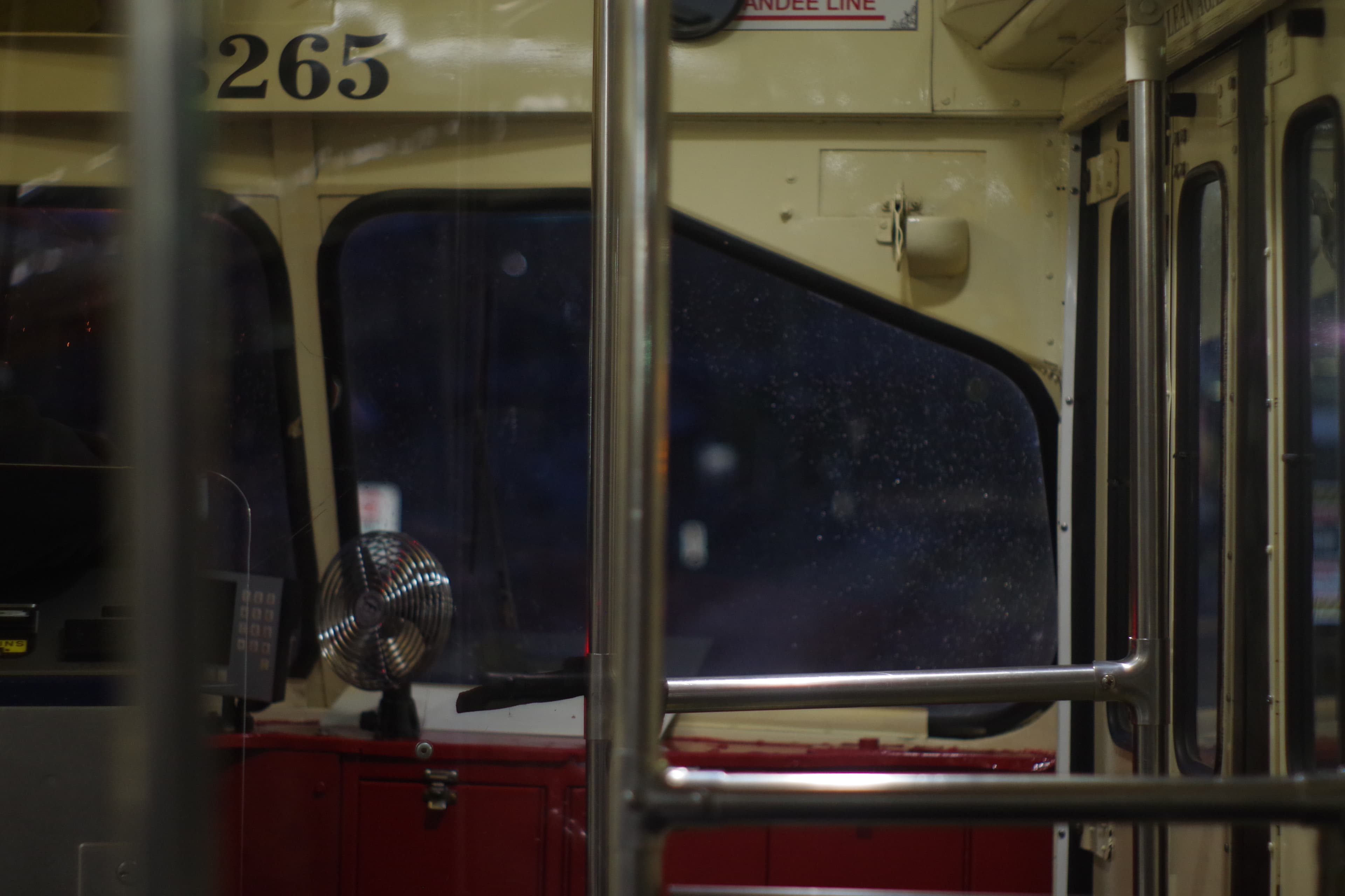 another picture looking out the front of the streetcar, this time with the interior of the streetcar in focus