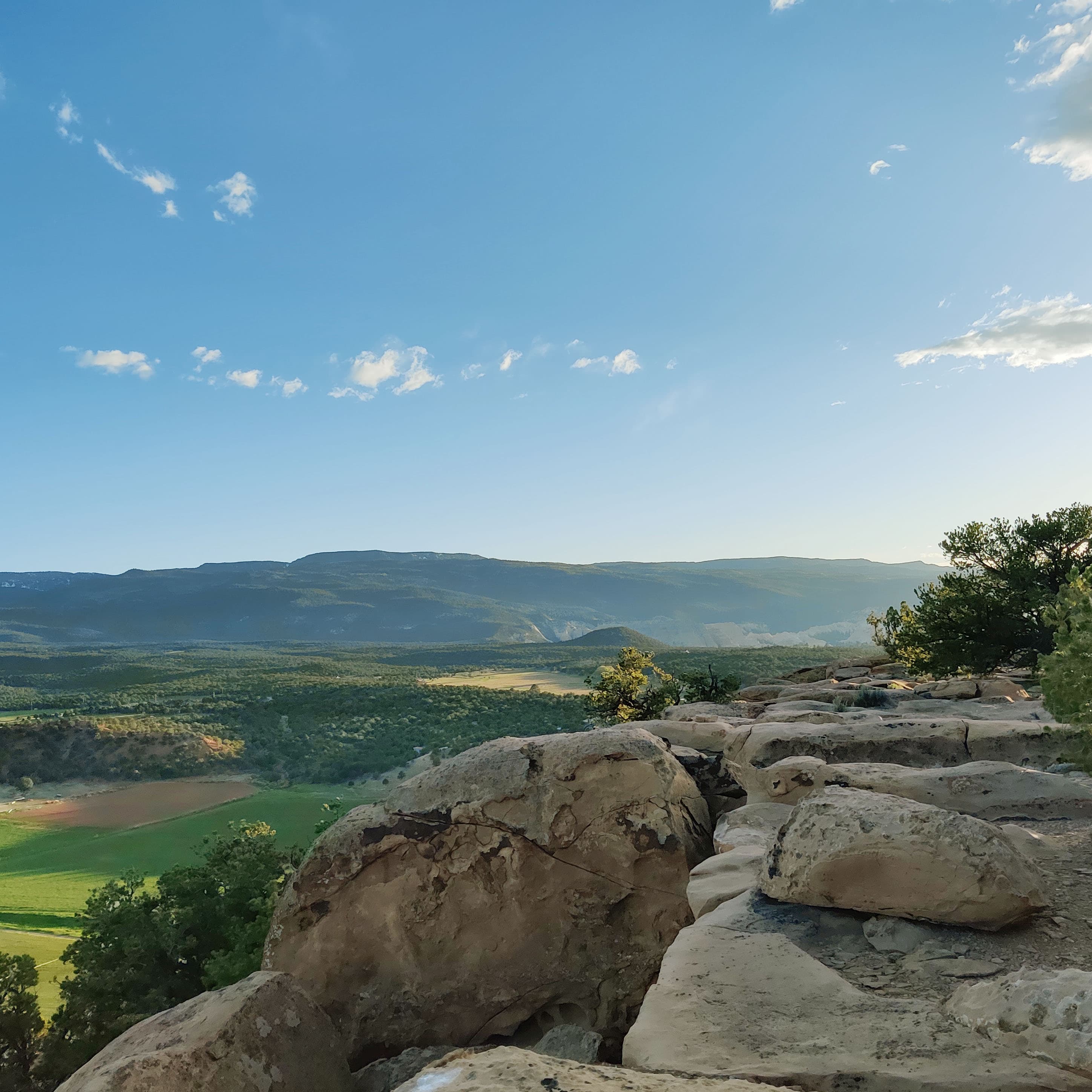 looking over the ridge of a small mountain