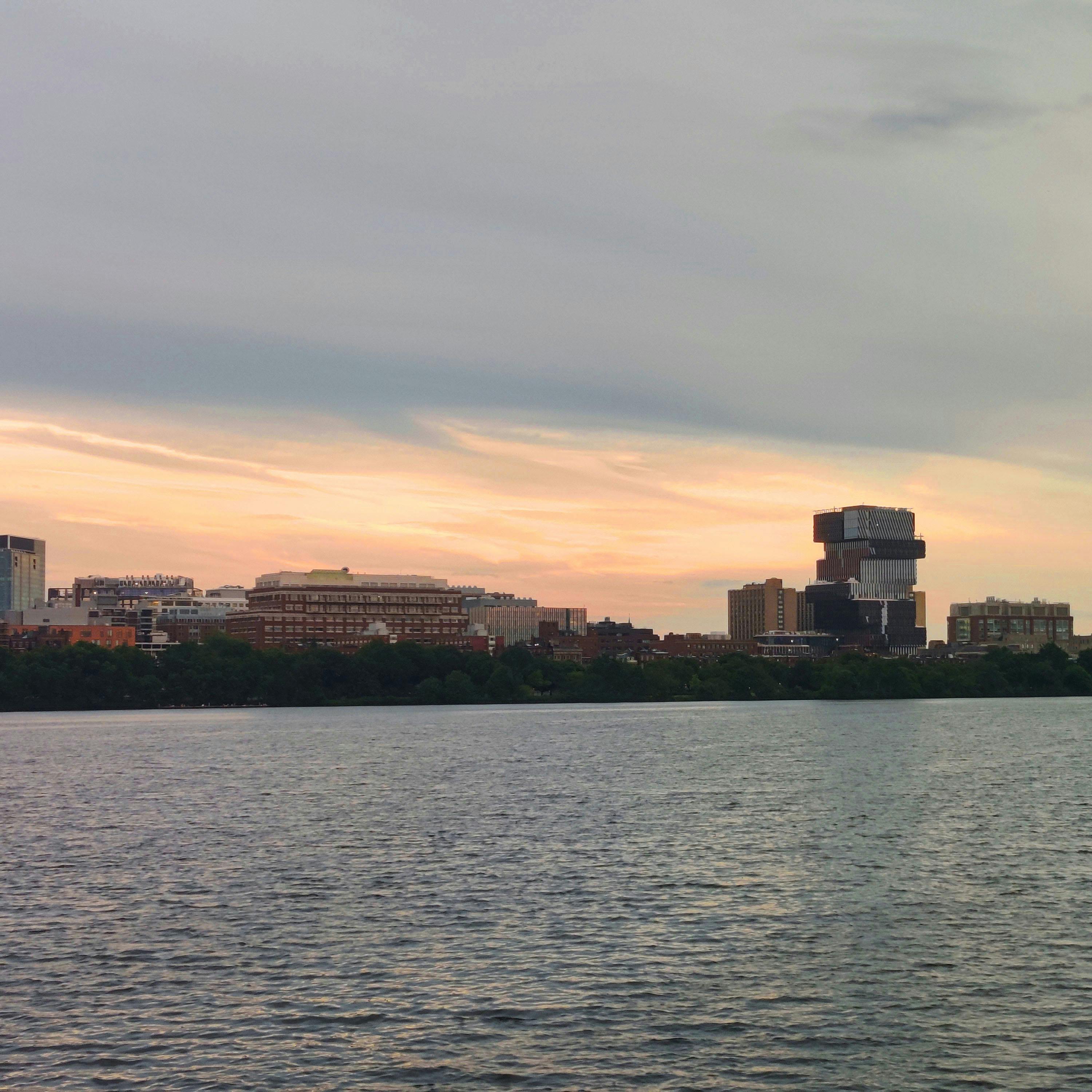 the boston university jenga tower building, from across the river